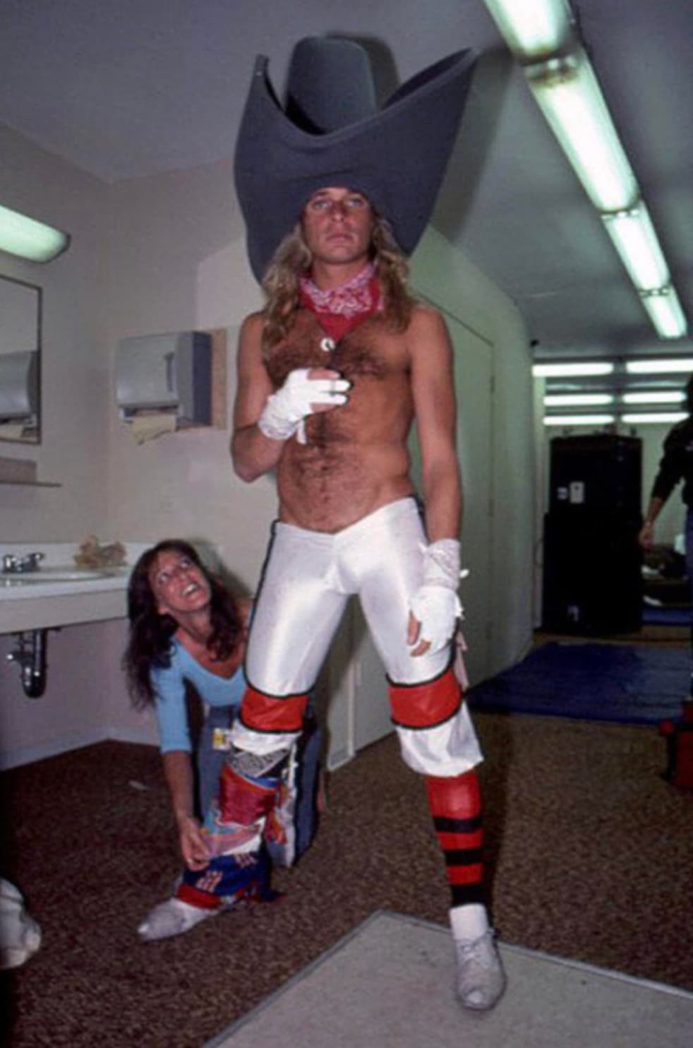 “David Lee Roth doing David Lee Roth things backstage before a 1981 Van Halen concert.” 